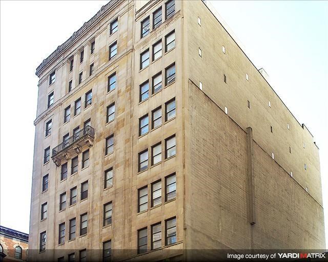 a tall building with a lot of windows