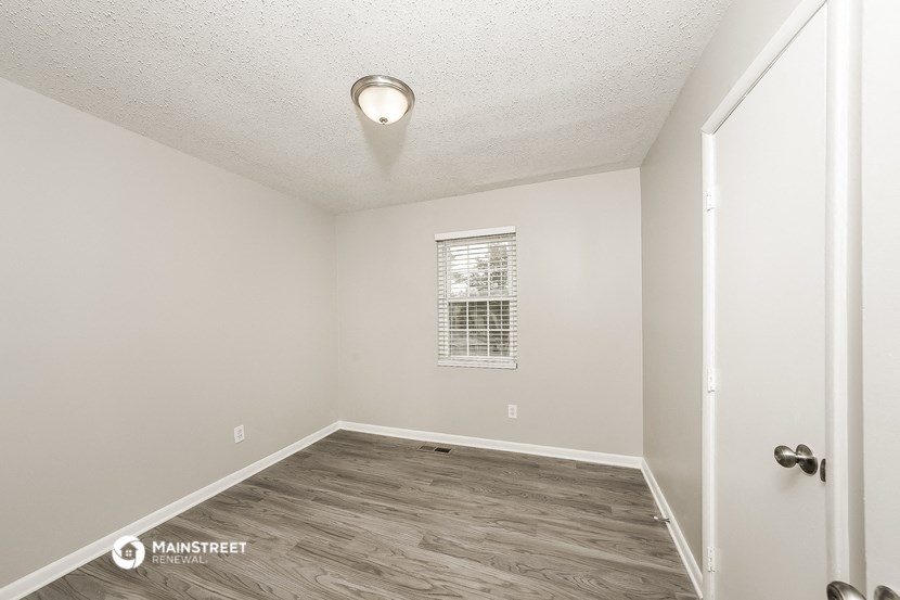 the spacious living room of our studio apartment at university estates in saint louis
