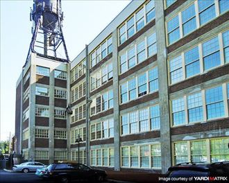 a large building with a water tower on top of it