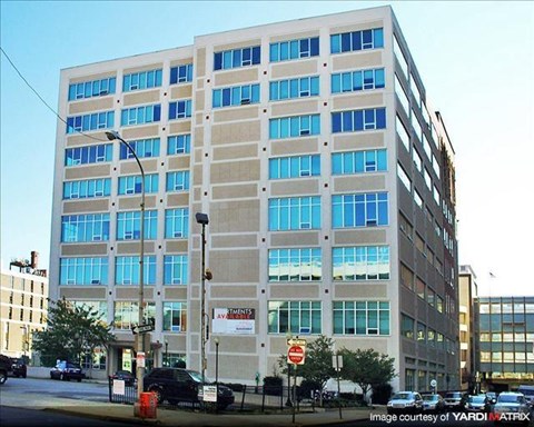a large building on the side of a street
