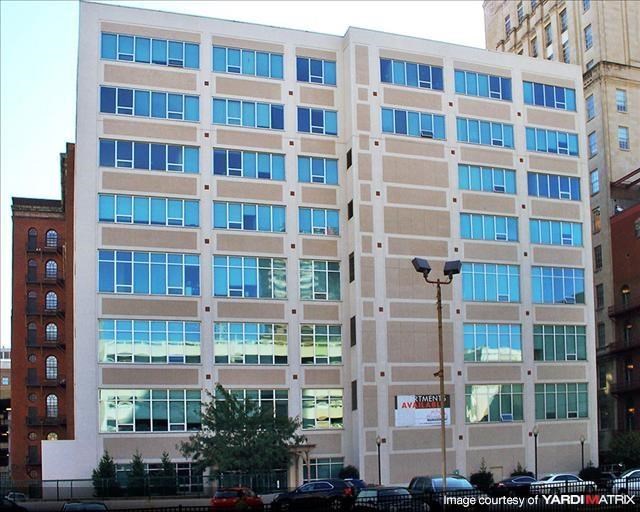 a large building on the side of a street