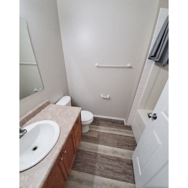 a bathroom with a sink and a toilet