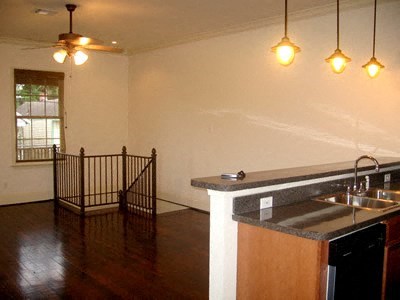 a kitchen with a sink and a counter top