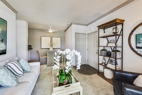 a living room with a couch and a coffee table