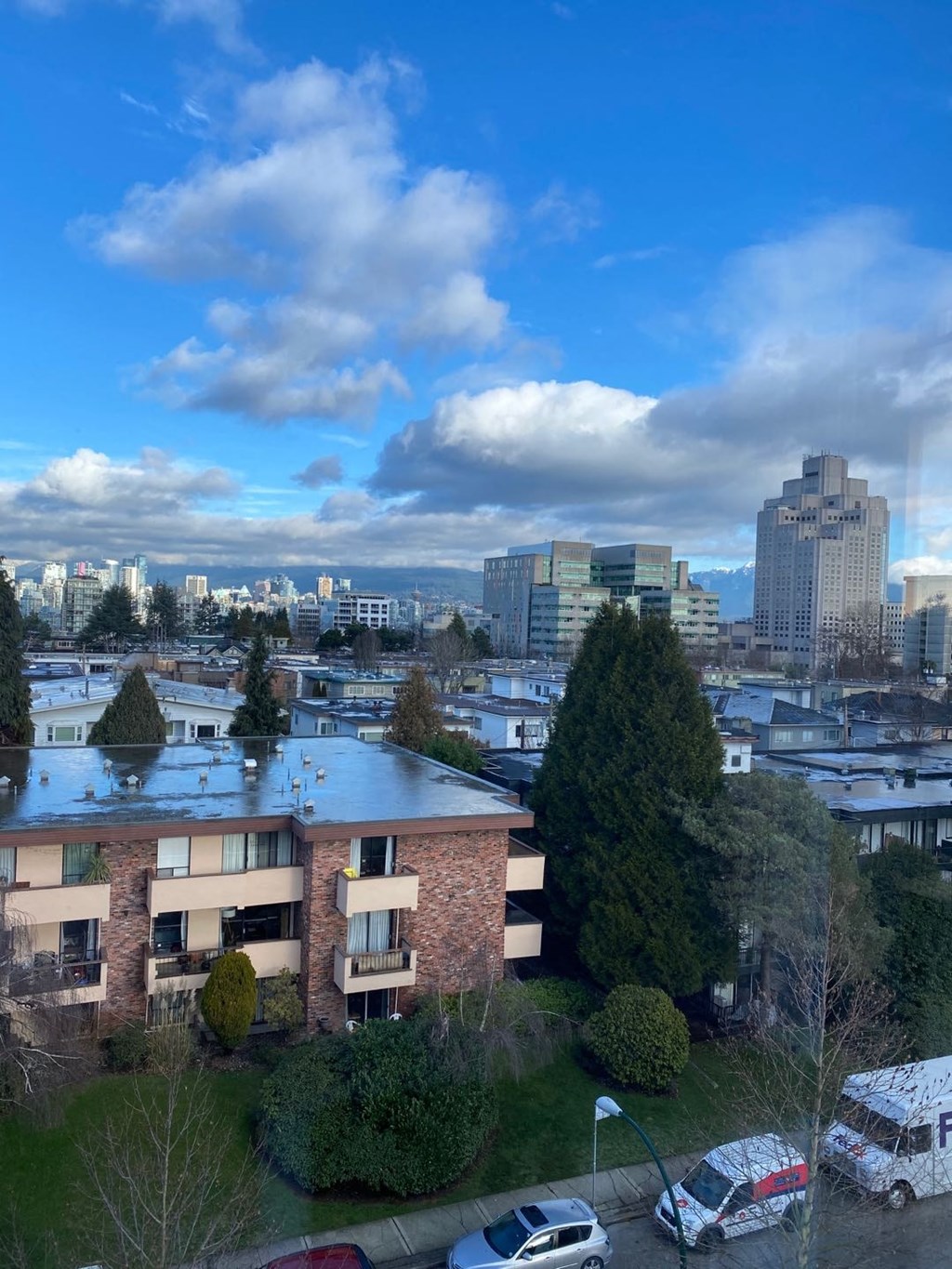 a view of the city from the roof of a building
