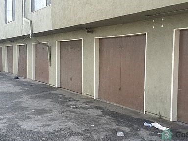 a row of doors on the side of a building