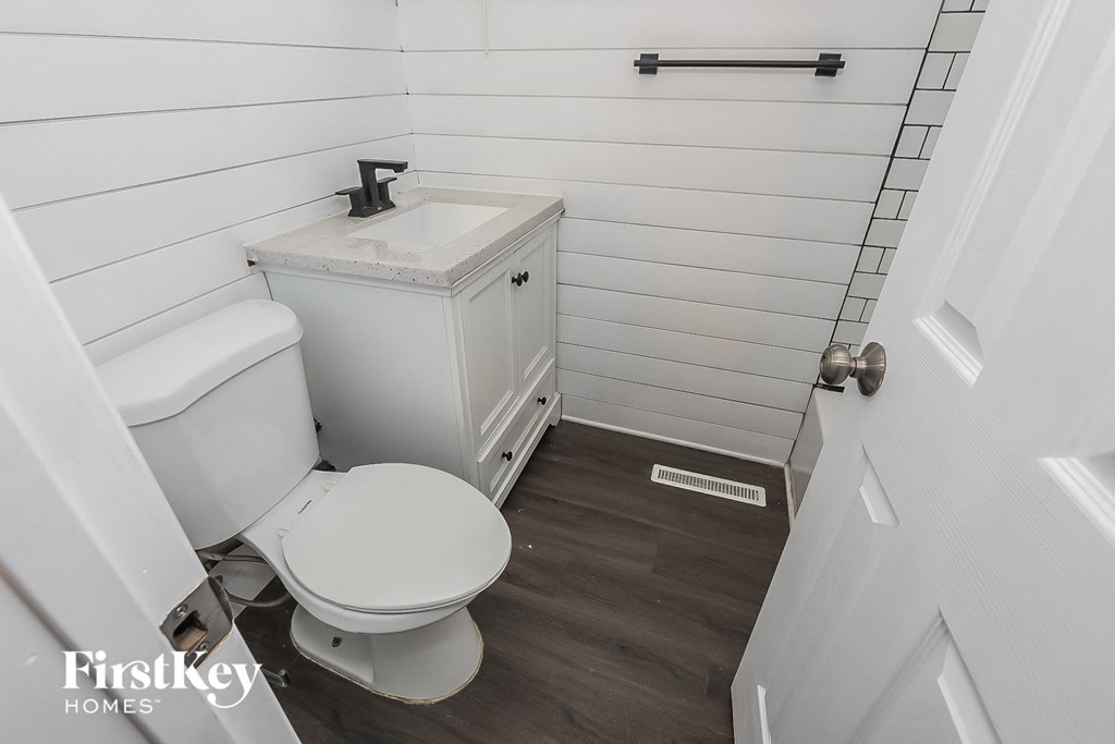 a small bathroom with a toilet and a sink