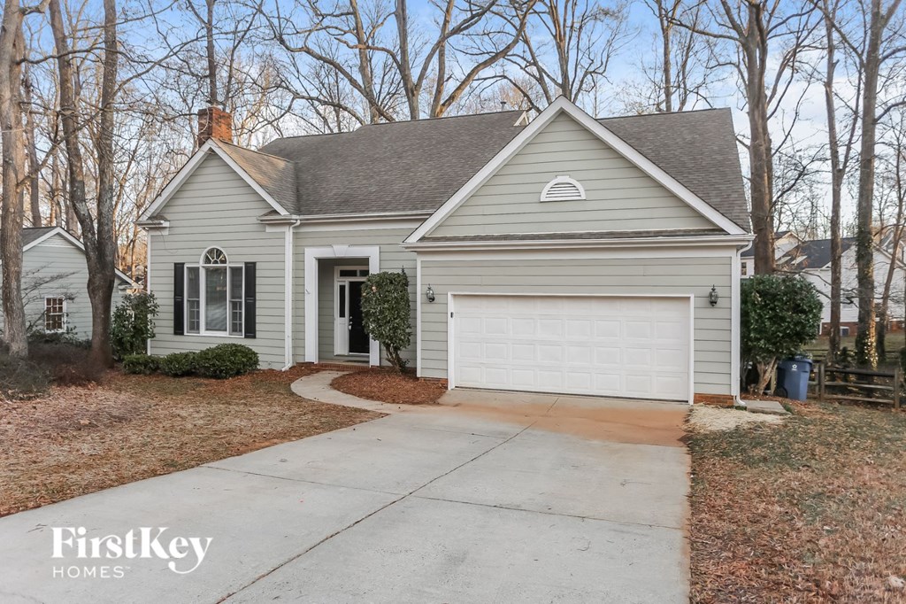 A house with a garage is for sale by FirstKey Homes.