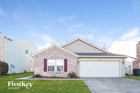A house with a garage is for sale by FirstKey Homes.