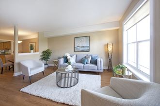Baker Arms & Wexford Apartments large open living room with big window in Dartmouth, NS