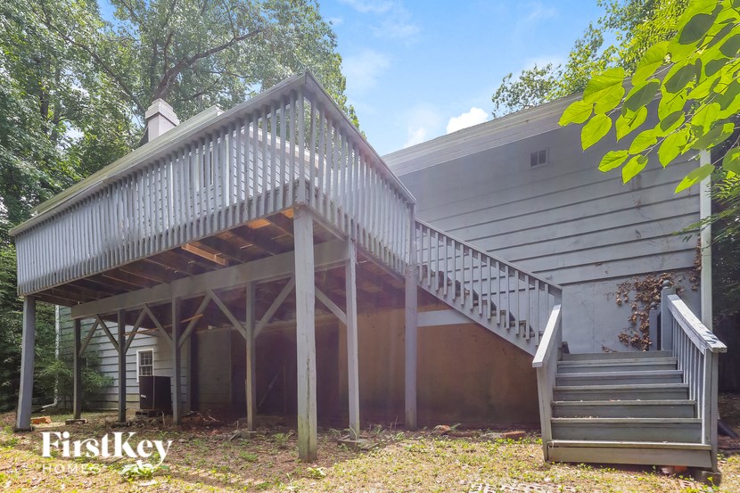 front view of the cottage with stairs to the porch