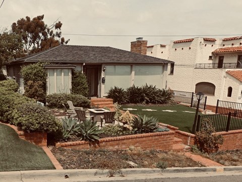 a house with a garden in front of it
