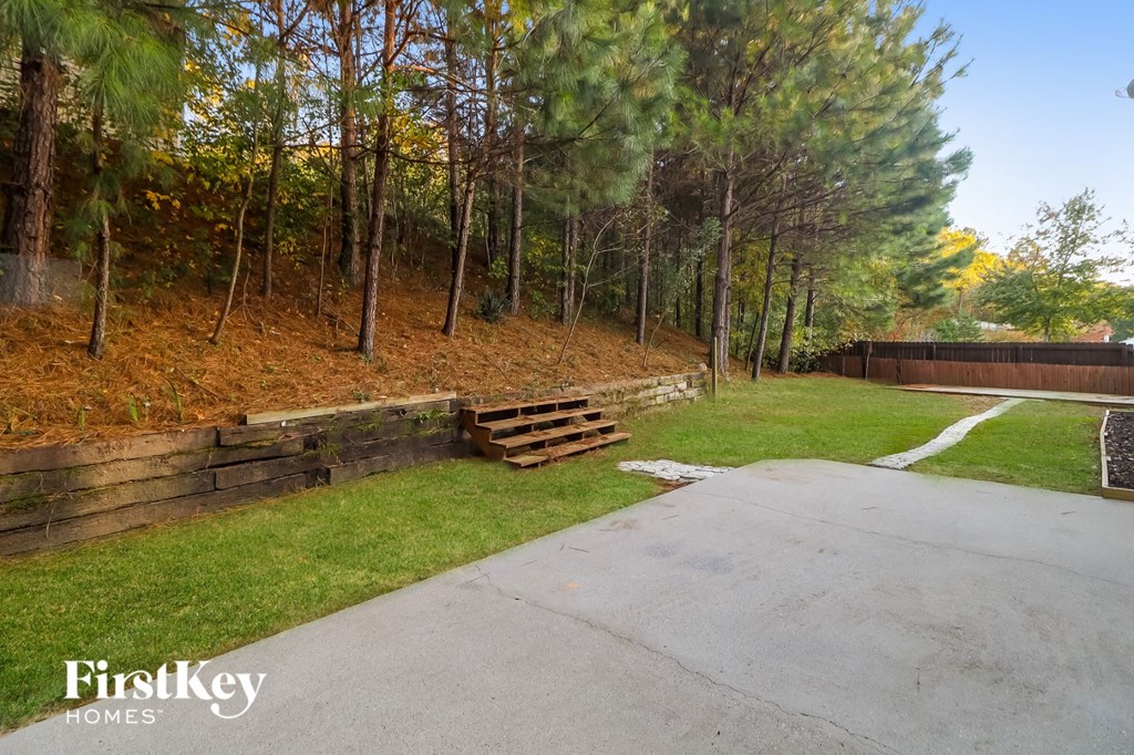 a park with benches on the side of a road