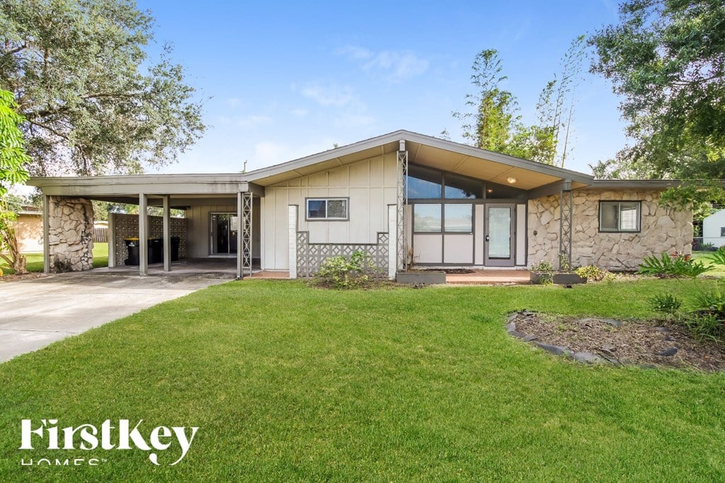a house with a lawn in front of it