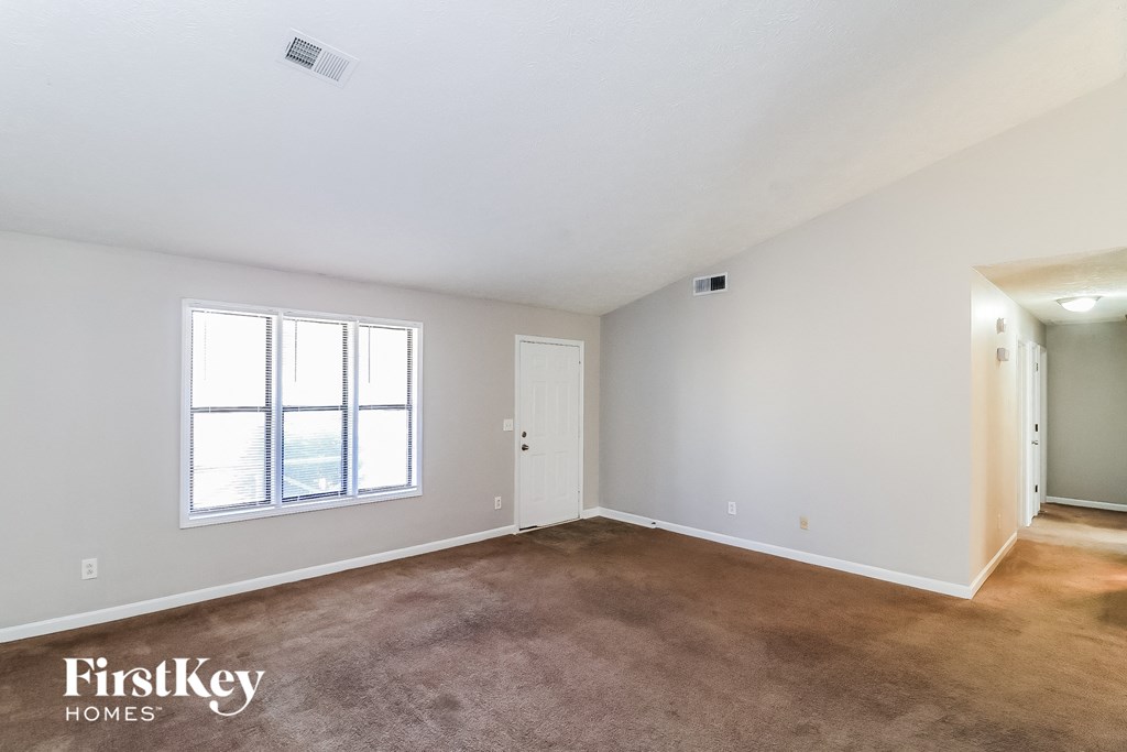 the living room is clean and ready to use