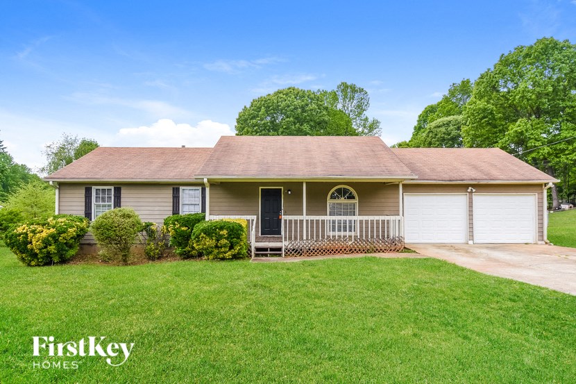 a house with a lawn in front of it