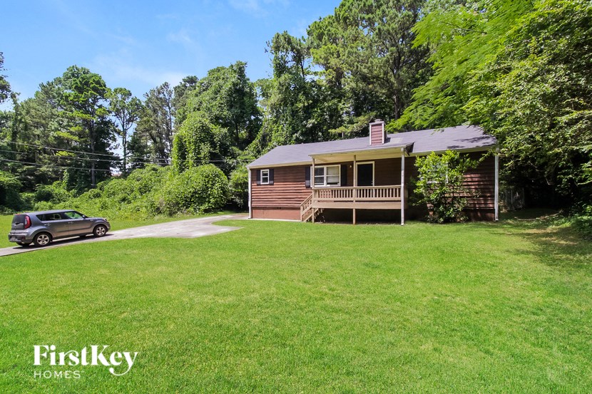 a house with a car parked in front of it