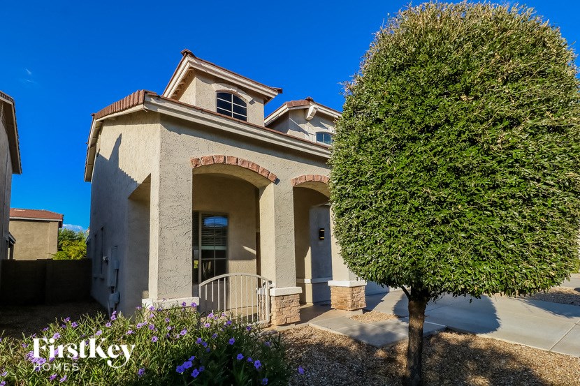 a house with a tree in front of it