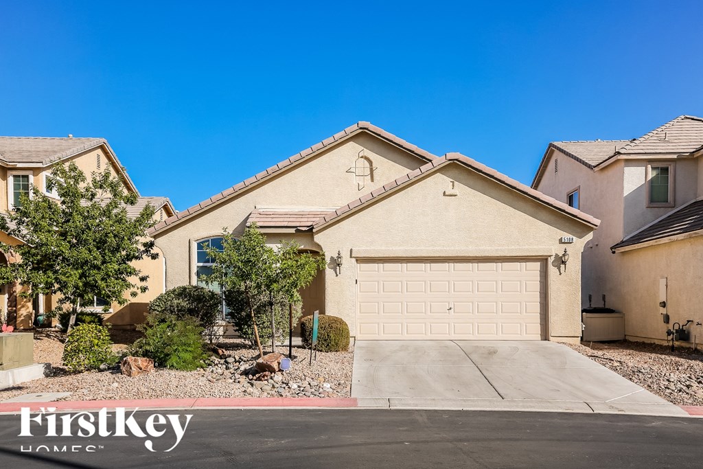 A house with a garage is for sale by FirstKey Homes.