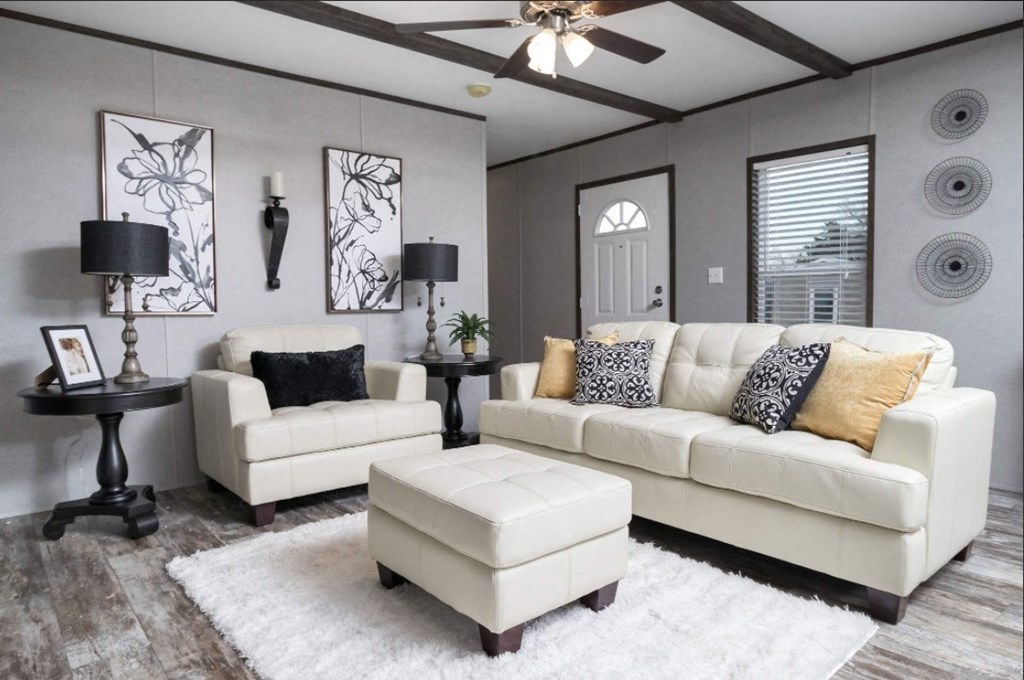 a living room with a couch and a chair