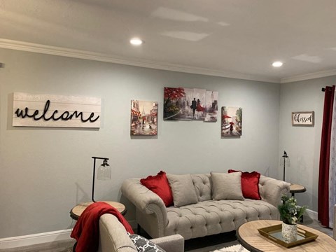 a living room with couches and a table