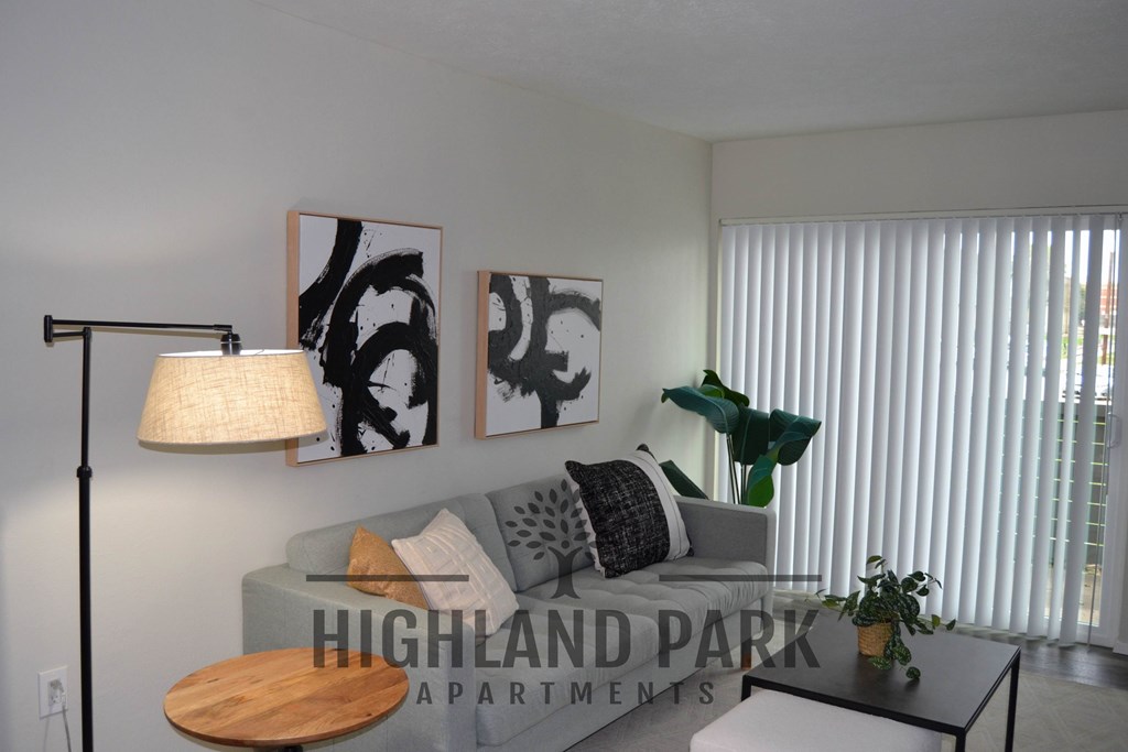 an image of a living room with a couch and a table