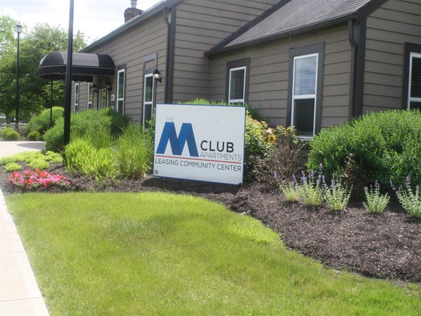 a building with a sign in front of it