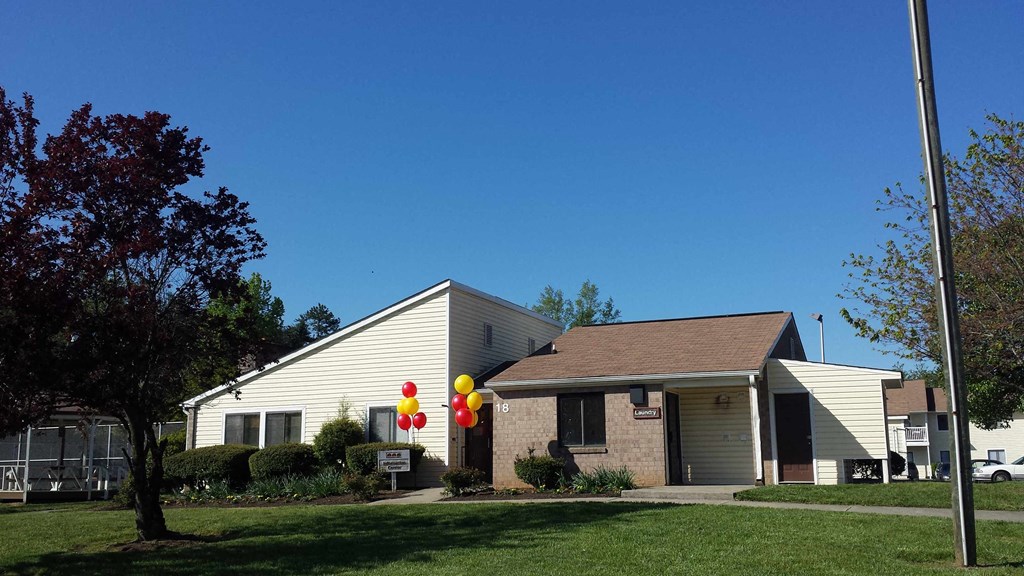 a house with balloons in front of it