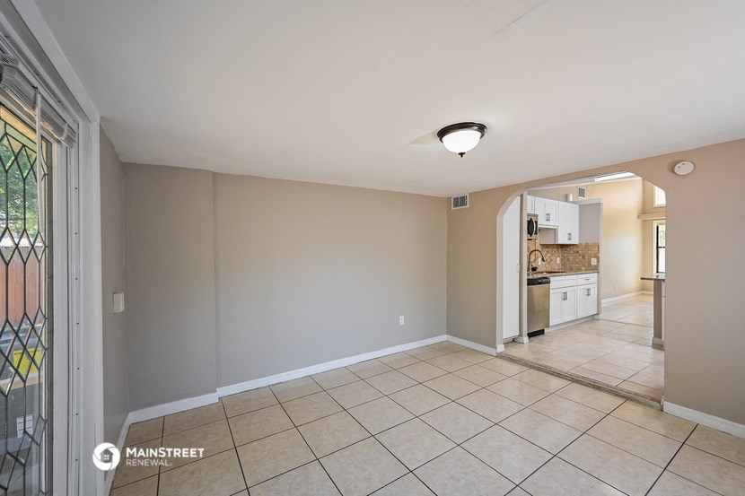 the living room and kitchen are spacious and clean