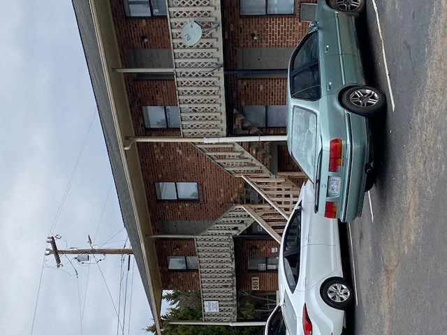 a car parked on the side of a building