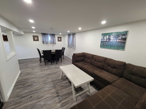 a living room with a couch and a table