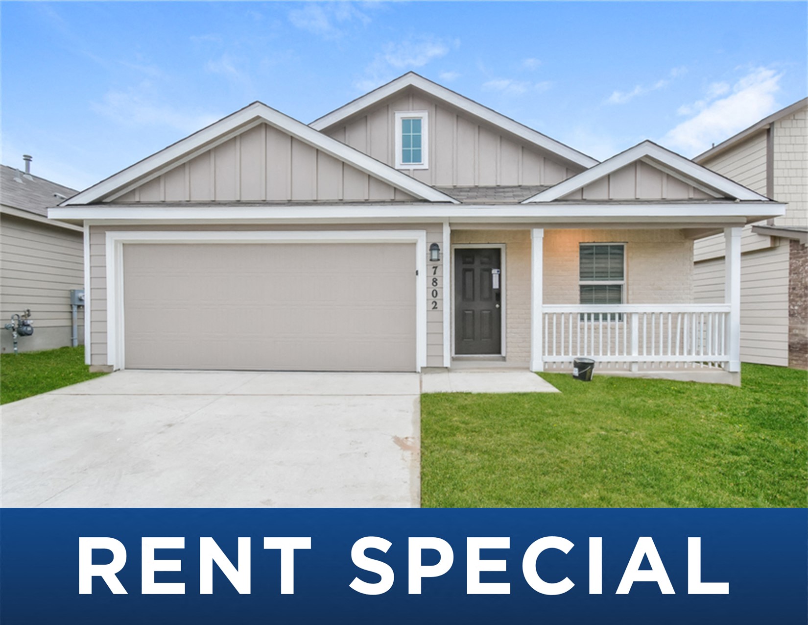 a house with the rent special sign in front of it