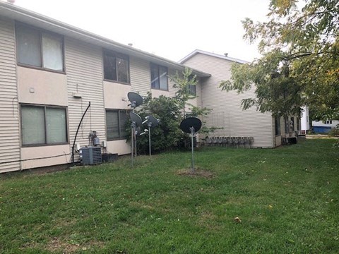 a house with a yard in front of it