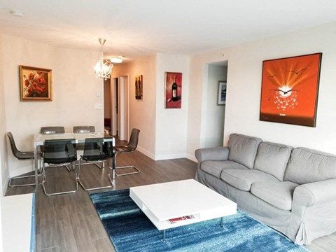 a living room with a couch and a table