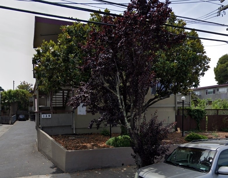a house with a car parked in front of it