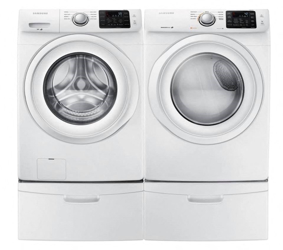 a close up of a washing machine and a dryer