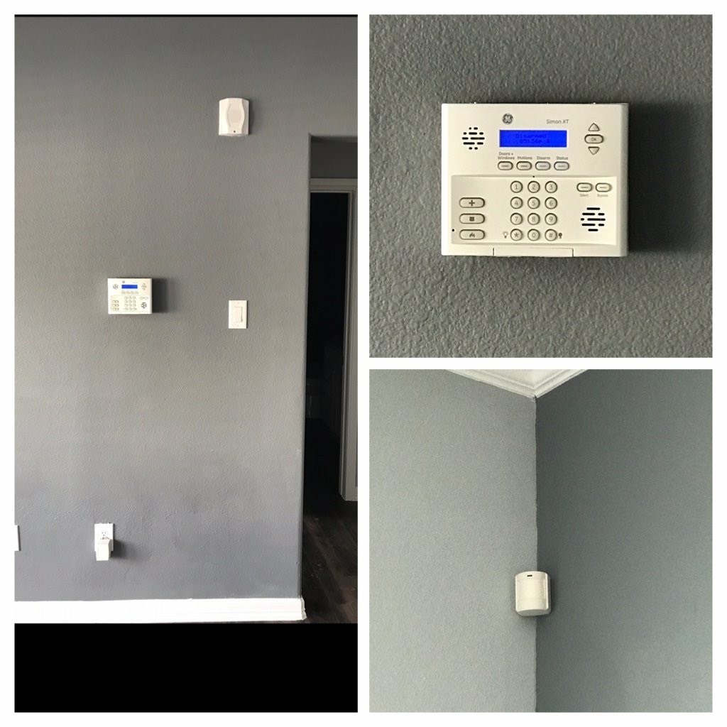 a thermostat on a wall and a sensor on the wall