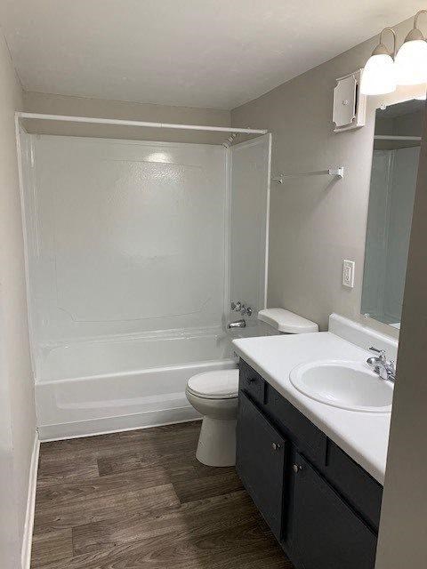 a bathroom with a sink toilet and a shower