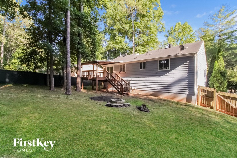a view of the house from the back yard