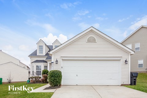 A house with a garage is for sale by FirstKey Homes.