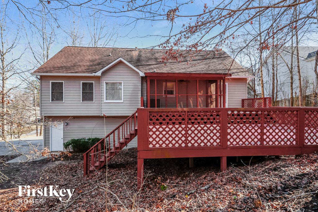 a house with a red porch and a red deck