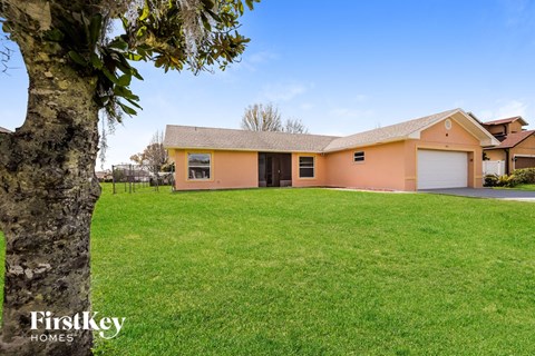 a large lawn in front of a house