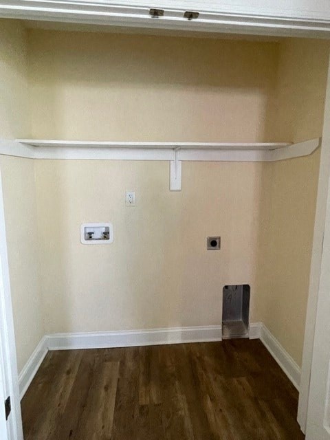 A room with a white shelf and a wooden floor.