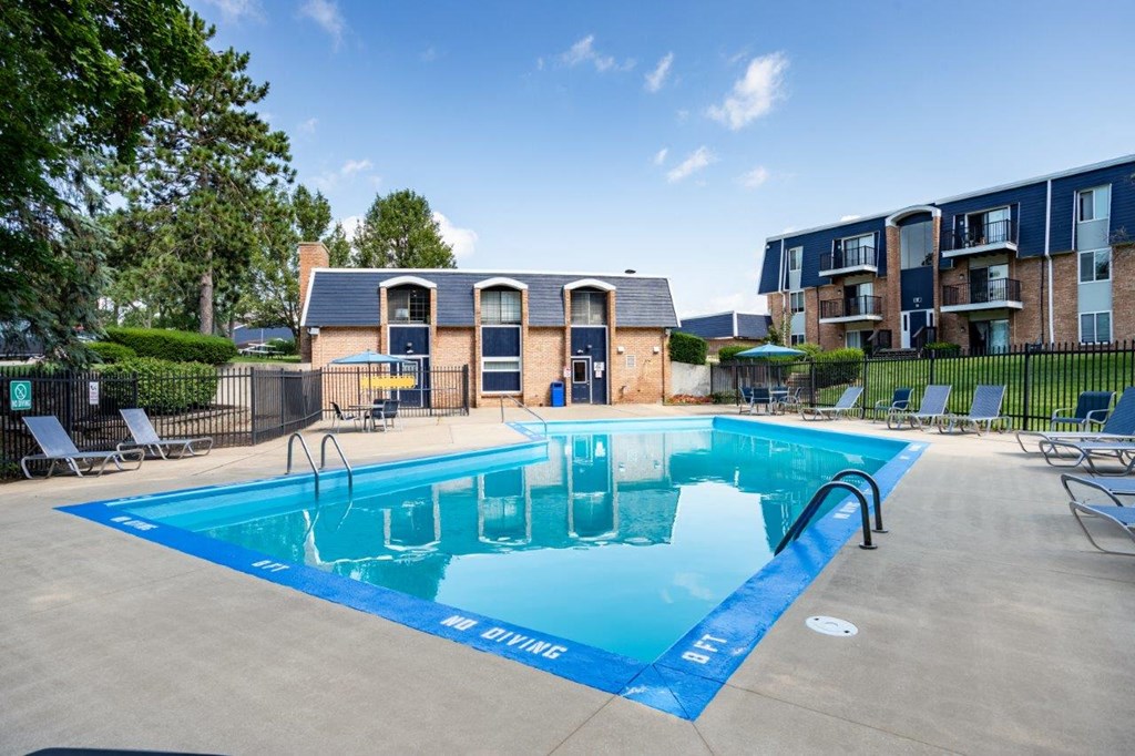 A swimming pool with the words "NO SWIMMING" written on the side.