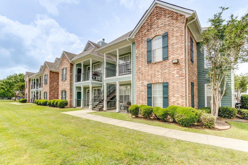 our apartments offer a spacious courtyard with grass