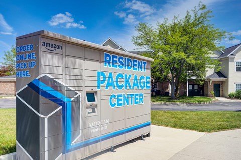 an delivery package center on the side of a sidewalk