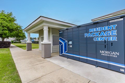 a building with a blue door and a sign that readsresident package center