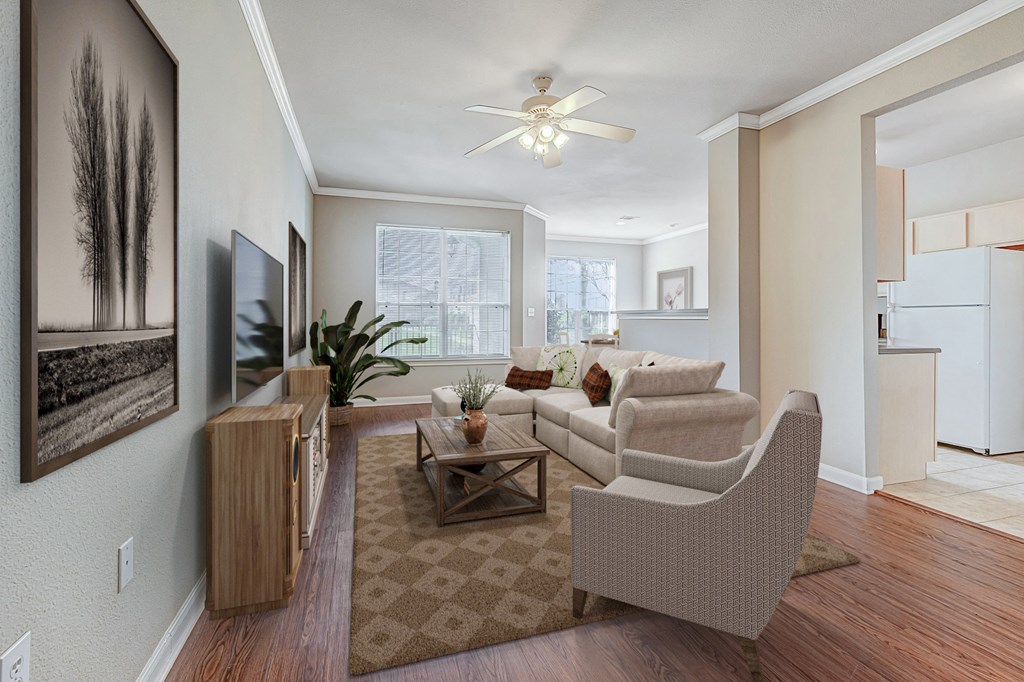 a living room with a couch and a chair