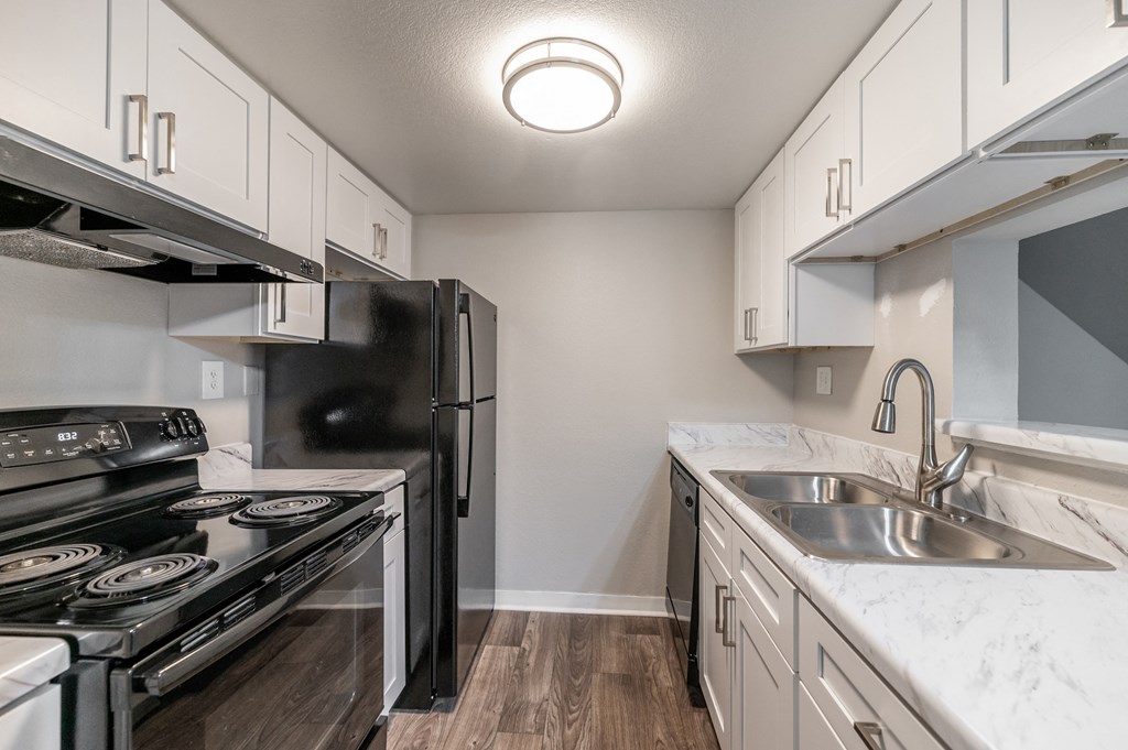 the preserve at ballantyne commons apartment kitchen with stainless steel appliances