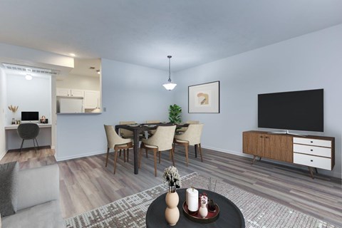 A modern living room with a dining table and chairs.